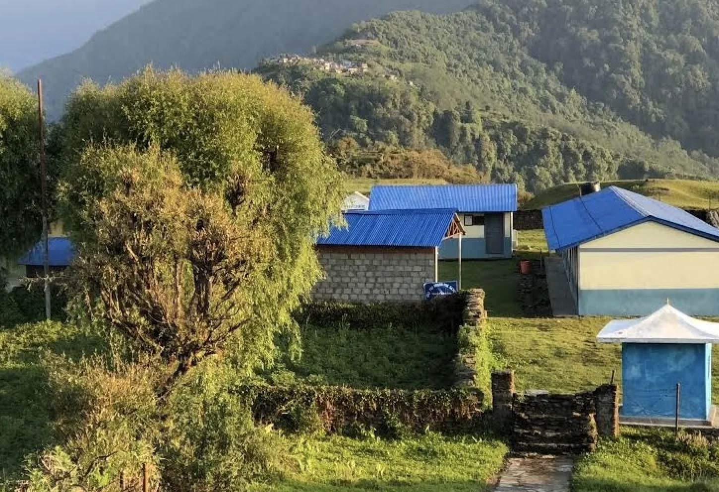 The village of Ghale Gaun above a Himalayan valley.